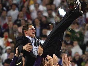 Фабио Капелло после победы в чемпионате Италии. Фото AFP Фабио Капелло после победы в чемпионате Италии. Фото AFP